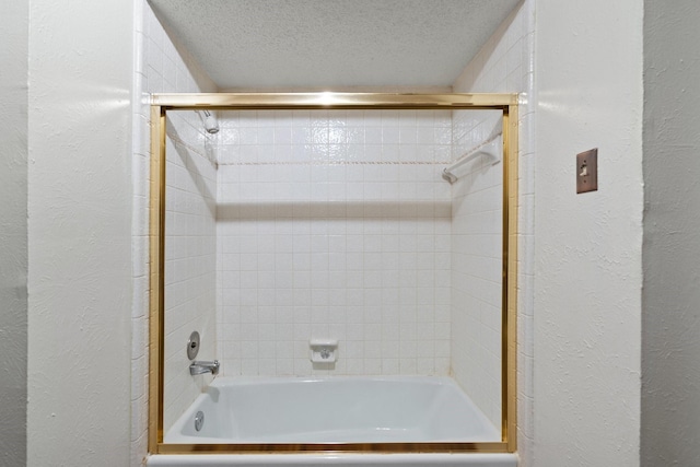 110 S Capri Dr, Duncanville, TX 75116 - full bath with a textured wall, combined bath / shower with glass door, and a textured ceiling
