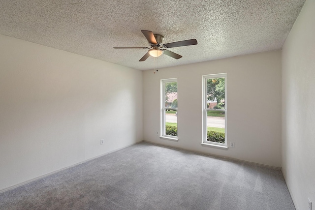 110 S Capri Dr, Duncanville, TX 75116 - spare room with a ceiling fan, carpet floors, and a textured ceiling