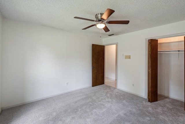 110 S Capri Dr, Duncanville, TX 75116 - unfurnished bedroom with carpet floors, a closet, a textured ceiling, and a ceiling fan