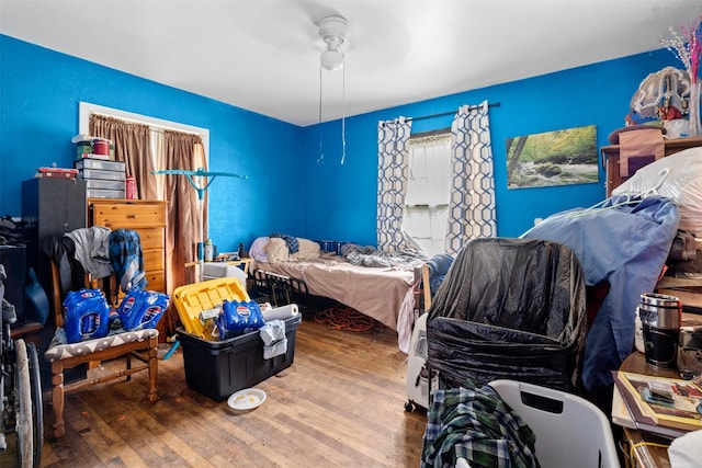 303 E Broadway St, Prosper, TX 75078 - bedroom featuring hardwood / wood-style flooring and ceiling fan