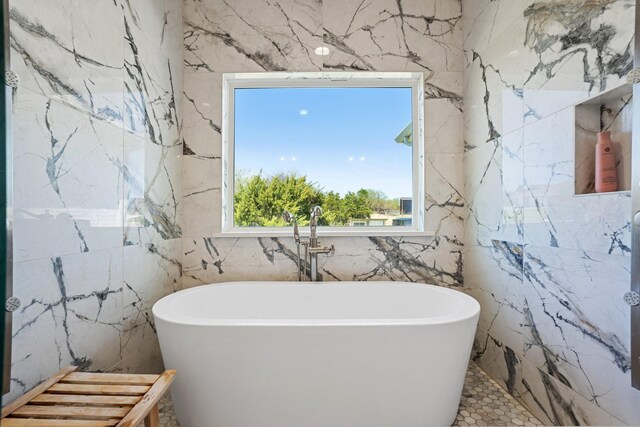 7954 Lax Dr, Fort Worth, TX 76126 - bathroom featuring tile walls and a freestanding bath