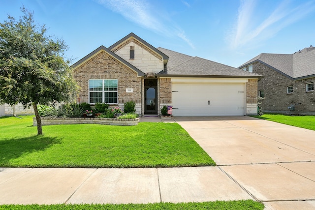 513 Saffron St, Princeton, TX 75407 - view of front of home featuring brick siding, an attached garage, and a front yard