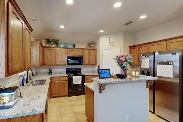 337 Grace Cir, Hurst, TX 76053 - kitchen featuring black appliances, a sink, a center island, light tile patterned flooring, and recessed lighting