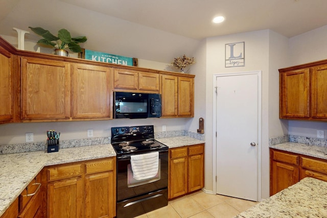 337 Grace Cir, Hurst, TX 76053 - kitchen featuring black appliances, light tile patterned floors, brown cabinets, light stone countertops, and recessed lighting