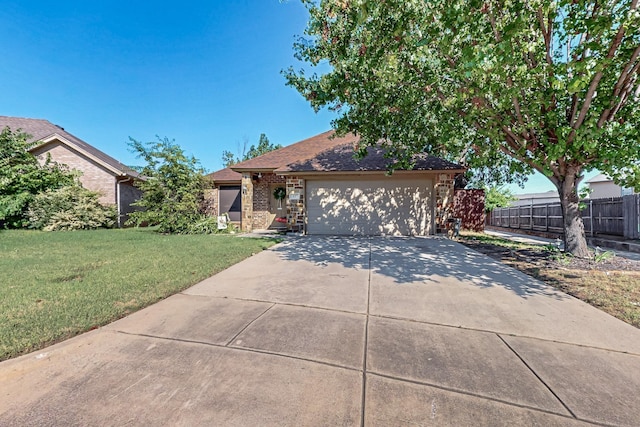 337 Grace Cir, Hurst, TX 76053 - view of front of home featuring driveway, a garage, and brick siding