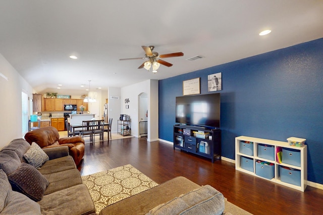 337 Grace Cir, Hurst, TX 76053 - living area with a ceiling fan, wood finished floors, baseboards, arched walkways, and recessed lighting