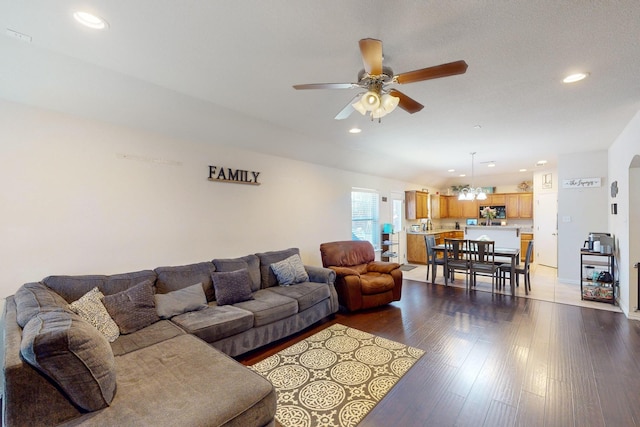 337 Grace Cir, Hurst, TX 76053 - living area featuring ceiling fan, recessed lighting, dark wood-style flooring, and baseboards