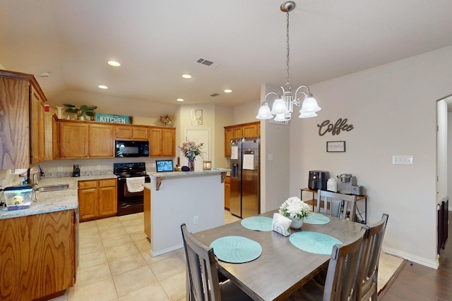 337 Grace Cir, Hurst, TX 76053 - dining area featuring a chandelier, recessed lighting, and light tile patterned floors