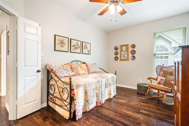 6717 Alcove Ln, Plano, TX 75024 - bedroom with dark wood-style flooring and ceiling fan
