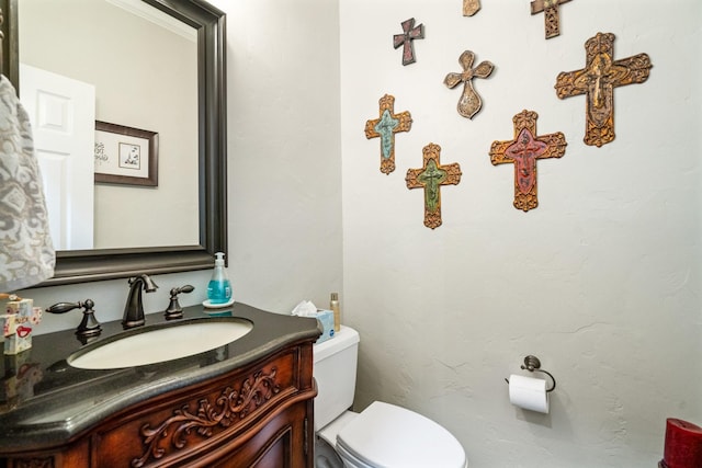 6717 Alcove Ln, Plano, TX 75024 - bathroom featuring toilet and vanity