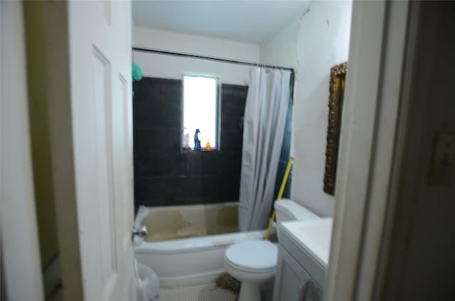 4413 Merida Ave, Fort Worth, TX 76115 - full bathroom featuring toilet, vanity, tile patterned flooring, and shower / tub combo