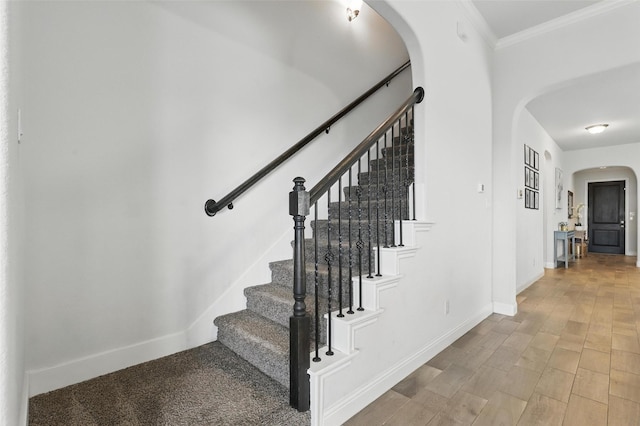 14825 Complacent Way, Aledo, TX 76008 - stairs featuring arched walkways, baseboards, crown molding, and wood finished floors