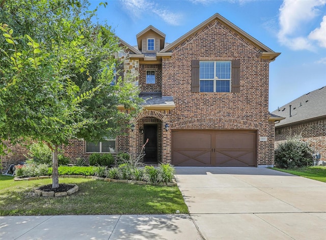 14825 Complacent Way, Aledo, TX 76008 - traditional-style house featuring brick siding, a garage, driveway, and a front lawn