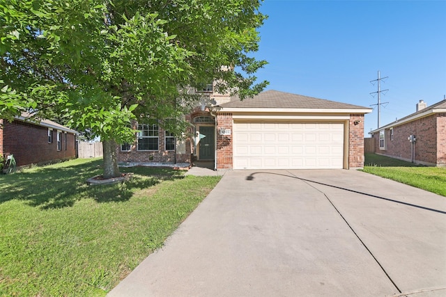 6321 Stone Lake Dr, Fort Worth, TX 76179 - view of front of home with driveway, brick siding, a garage, and a front yard