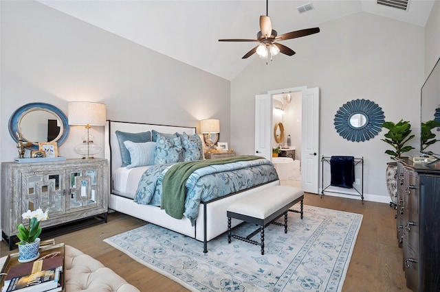 3228 Zenyatta Ct, Celina, TX 75009 - bedroom with wood finished floors, high vaulted ceiling, ensuite bathroom, baseboards, and ceiling fan
