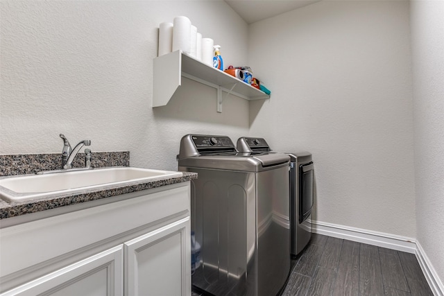 1814 Indigo Creek Ln, Wylie, TX 75098 - washroom featuring washer and clothes dryer, cabinet space, baseboards, and dark wood-style flooring