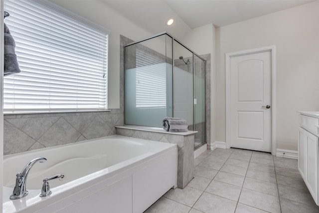 1814 Indigo Creek Ln, Wylie, TX 75098 - bathroom with a garden tub, a stall shower, tile patterned floors, recessed lighting, and vanity