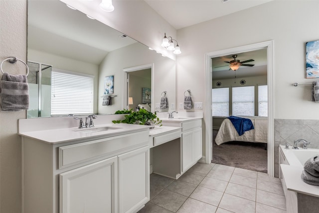 1814 Indigo Creek Ln, Wylie, TX 75098 - full bathroom featuring tile patterned flooring, double vanity, a ceiling fan, a garden tub, and ensuite bath