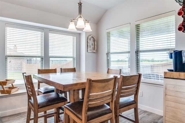 3118 Oak Crest Dr, Royse City, TX 75189 - dining room with light wood finished floors, baseboards, and vaulted ceiling