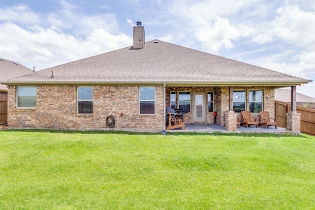 3118 Oak Crest Dr, Royse City, TX 75189 - back of house with a shingled roof, a chimney, a patio, and brick siding