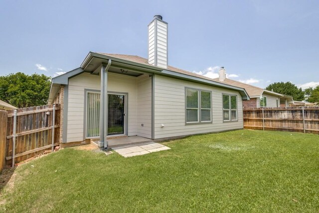 3820 Denridge Ln, Fort Worth, TX 76262 - back of property featuring a chimney