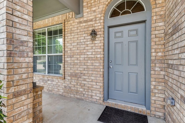 3820 Denridge Ln, Fort Worth, TX 76262 - property entrance with brick siding and covered porch