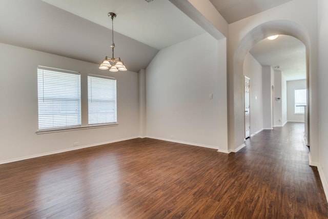 3820 Denridge Ln, Fort Worth, TX 76262 - unfurnished room with dark wood-type flooring, arched walkways, a chandelier, baseboards, and lofted ceiling