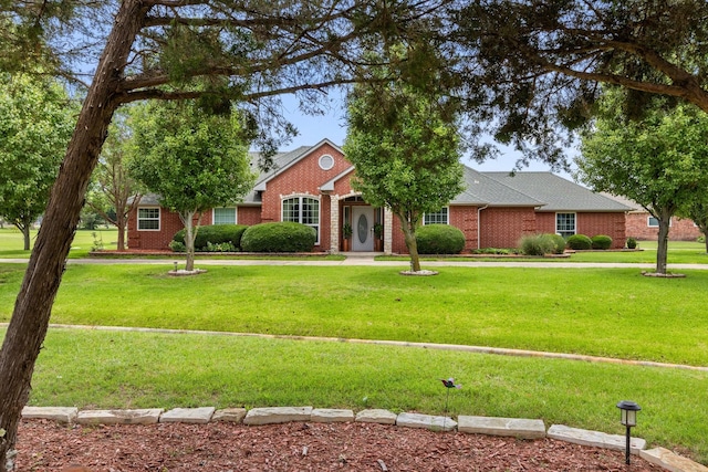 300 Burtonwood Cir, Ovilla, TX 75154 - view of front of home with brick siding and a front yard