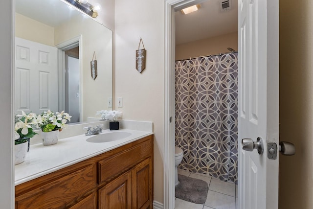 300 Burtonwood Cir, Ovilla, TX 75154 - bathroom featuring vanity, toilet, and tile patterned floors