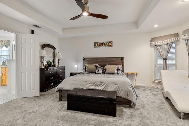 300 Burtonwood Cir, Ovilla, TX 75154 - carpeted bedroom with multiple windows, a tray ceiling, recessed lighting, and a ceiling fan