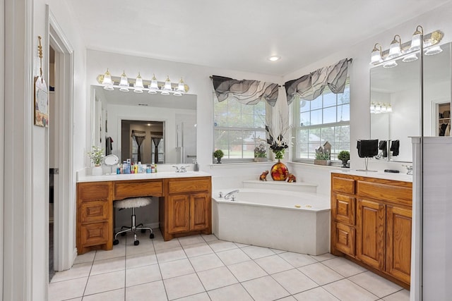 300 Burtonwood Cir, Ovilla, TX 75154 - bathroom with two vanities, a bath, and tile patterned flooring