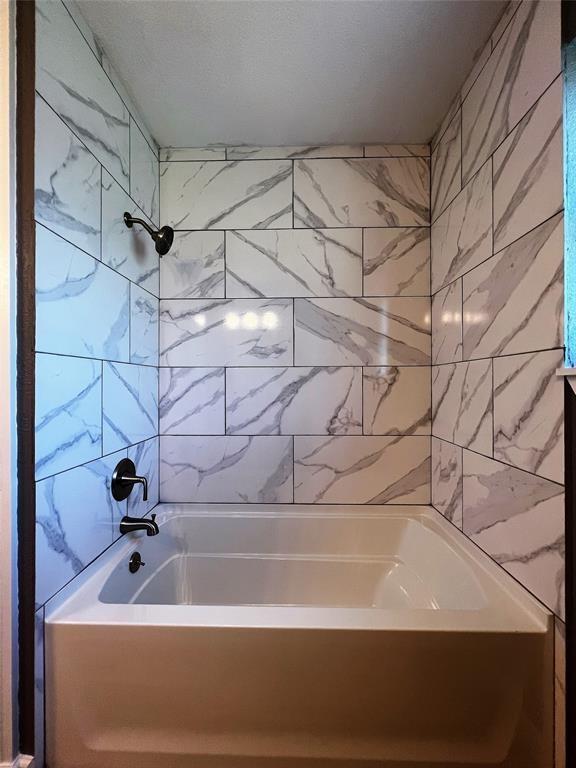 1432 Hurstview Dr, Hurst, TX 76053 - bathroom with  shower combination
