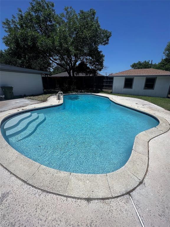 1432 Hurstview Dr, Hurst, TX 76053 - outdoor pool with a patio