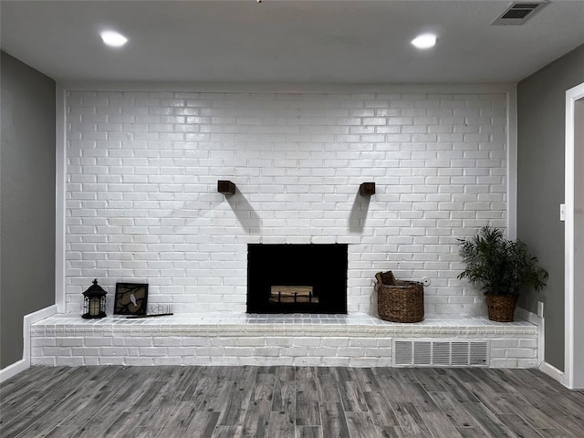 1432 Hurstview Dr, Hurst, TX 76053 - detailed view of a fireplace, wood finished floors, baseboards, and recessed lighting