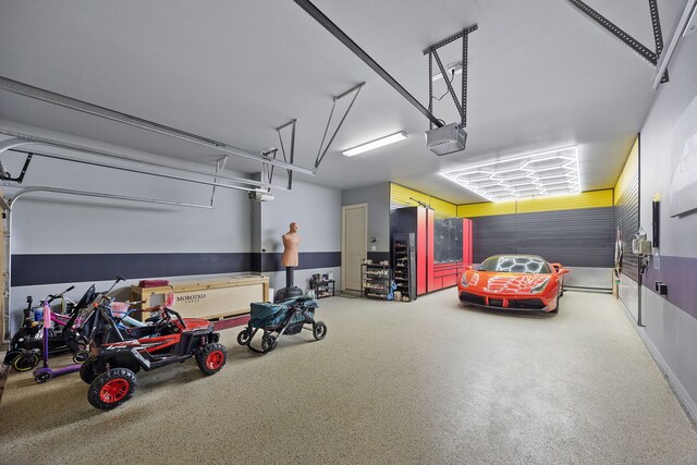 6208 Jacqueline Dr, Plano, TX 75024 - garage featuring a garage door opener
