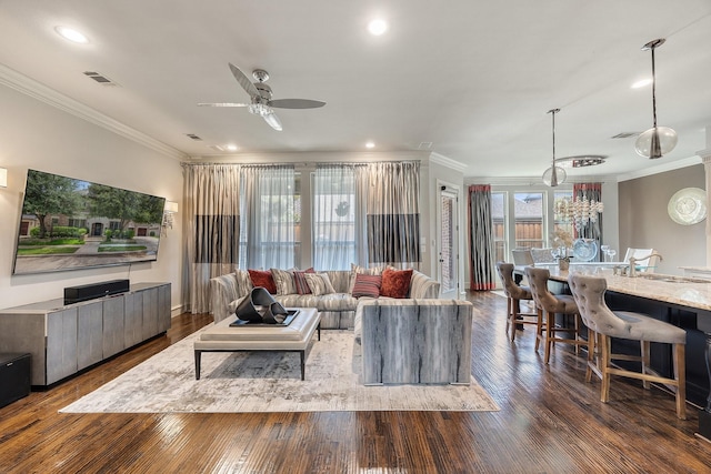 6208 Jacqueline Dr, Plano, TX 75024 - living area featuring ornamental molding, a ceiling fan, dark wood-type flooring, recessed lighting, and baseboards