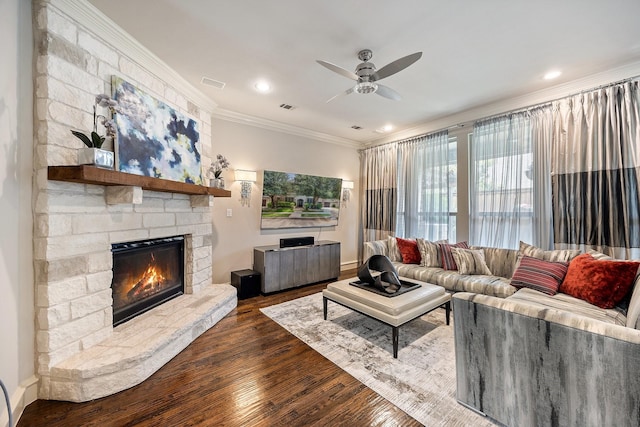 6208 Jacqueline Dr, Plano, TX 75024 - living area featuring crown molding, ceiling fan, dark wood-type flooring, a fireplace, and baseboards