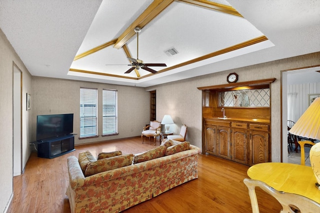 2521 La Vida Pl, Plano, TX 75023 - living area with light wood-style flooring, ceiling fan, and lofted ceiling
