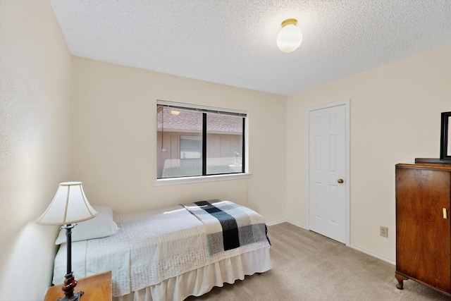 2521 La Vida Pl, Plano, TX 75023 - bedroom featuring carpet floors, a textured ceiling, and baseboards