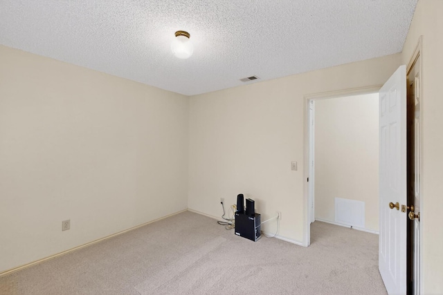 2521 La Vida Pl, Plano, TX 75023 - carpeted empty room with a textured ceiling