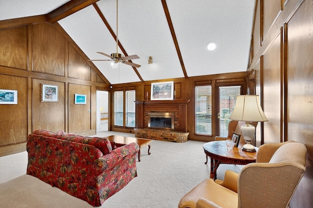 2521 La Vida Pl, Plano, TX 75023 - carpeted living room with a brick fireplace, ceiling fan, high vaulted ceiling, wooden walls, and beamed ceiling