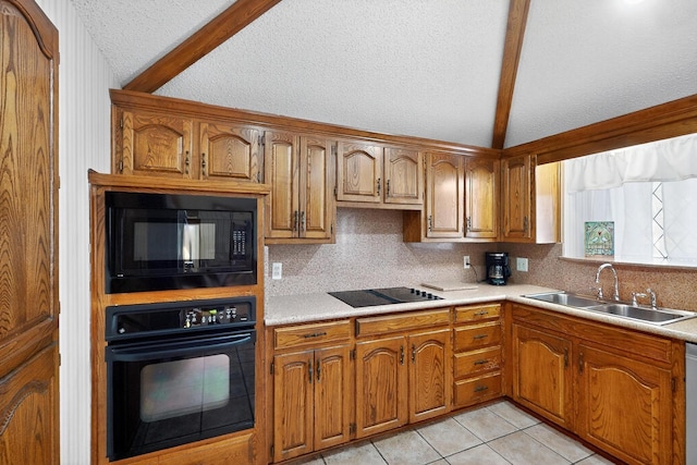 2521 La Vida Pl, Plano, TX 75023 - kitchen with black appliances, a sink, decorative backsplash, a textured ceiling, and brown cabinetry
