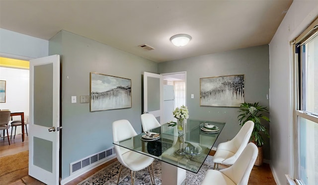 10502 Aledo Dr, Dallas, TX 75228 - dining room with baseboards and wood finished floors
