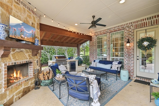 12669 Winding Hollow Ln, Frisco, TX 75033 - view of patio featuring area for grilling, an outdoor living space with a fireplace, and ceiling fan
