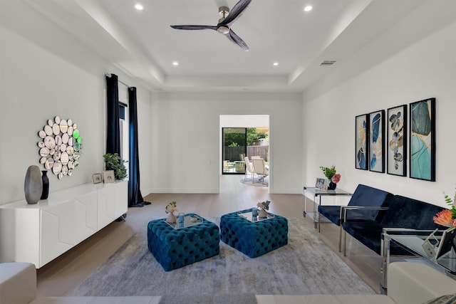 3932 Cortez Dr, Dallas, TX 75220 - living area featuring a tray ceiling, ceiling fan, recessed lighting, baseboards, and wood finished floors