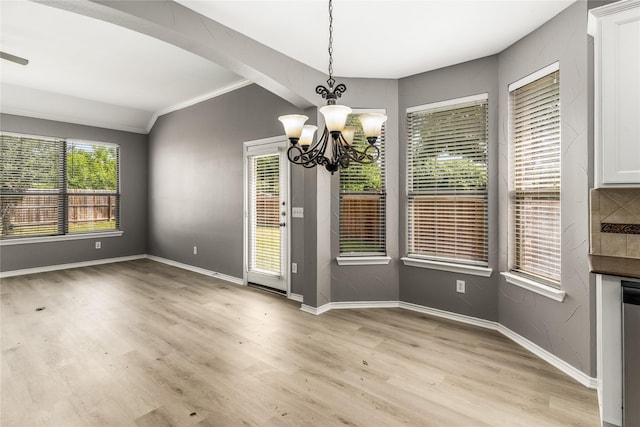 7500 Archer Way, Mckinney, TX 75072 - unfurnished dining area with ornamental molding, a chandelier, light wood-style floors, and baseboards
