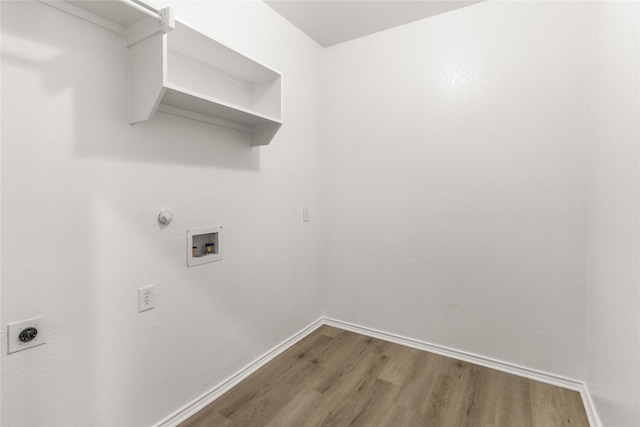 7500 Archer Way, Mckinney, TX 75072 - laundry room featuring wood finished floors, electric dryer hookup, baseboards, hookup for a washing machine, and gas dryer hookup