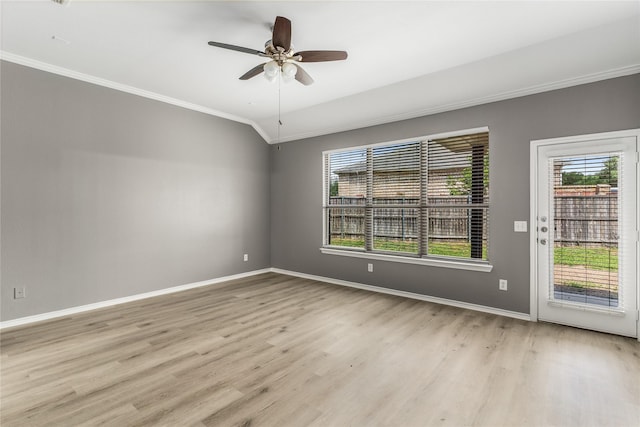 7500 Archer Way, Mckinney, TX 75072 - unfurnished room with crown molding, healthy amount of natural light, light wood-style floors, and baseboards