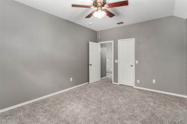 7500 Archer Way, Mckinney, TX 75072 - unfurnished bedroom with carpet floors, baseboards, ceiling fan, and lofted ceiling