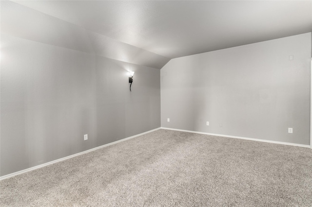 7500 Archer Way, Mckinney, TX 75072 - carpeted spare room with vaulted ceiling and baseboards